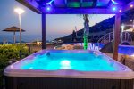 Enjoy a Hot Tub Jacuzzi at Panorama Villa in Paphos – the perfect amenity for bachelor and wedding parties.