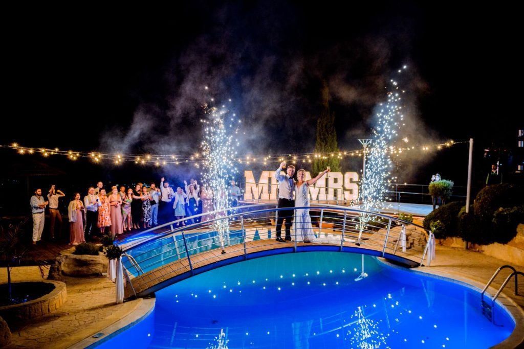 Destination wedding celebrations with the fire sparklers.
