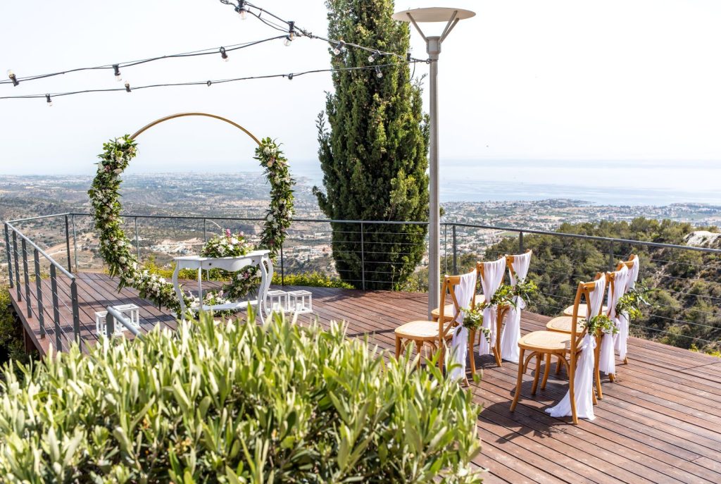 Round wedding arch with green flowers. Cyprus wedding villas 2027.